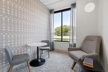 Coworking lounge with private meeting spaces